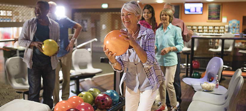 People Enjoying Bowling 