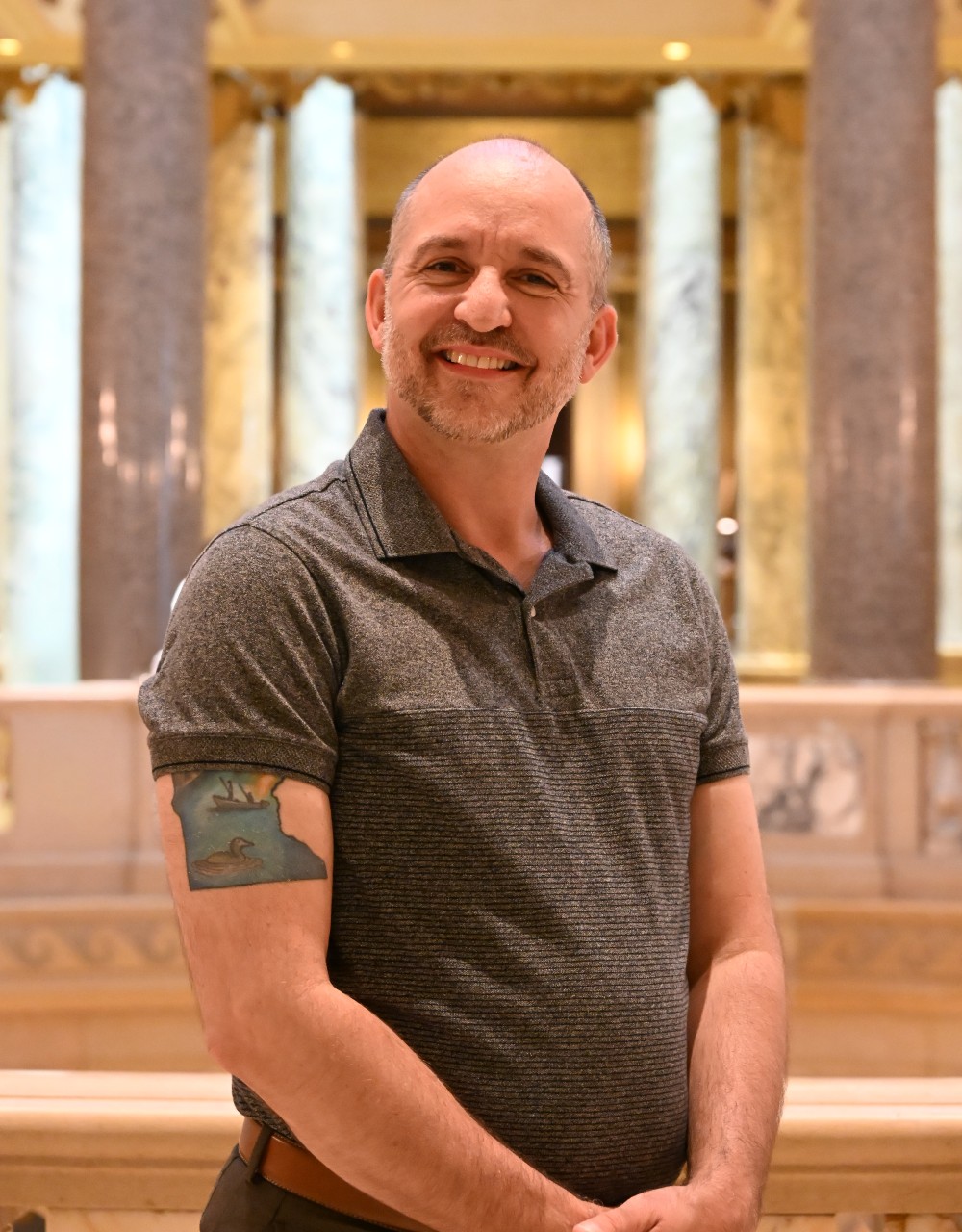 Smiling person within the Minnesota State Capitol