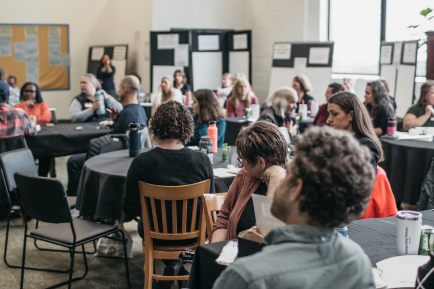 Room full of Interpreting Forward participants at a summit