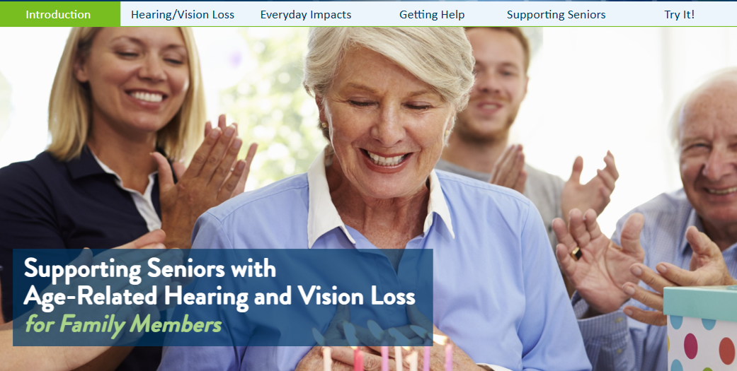 Supporting Seniors with Hearing and Vision Loss. An older woman surrounded by family blows out candles on a cake.