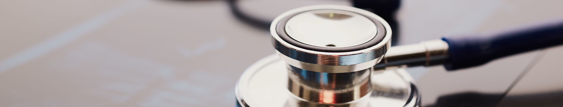 A banner image with a stethoscope sitting on a table