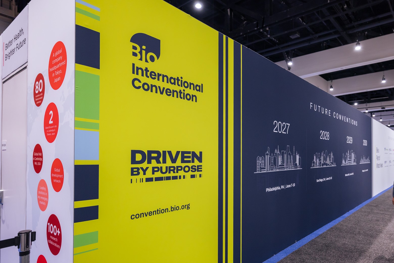 Picture of a wall that has the Bio International Convention logo.
