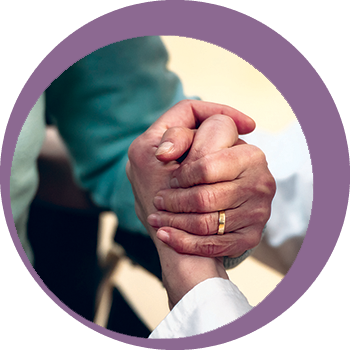 patient hand grasping doctor hand