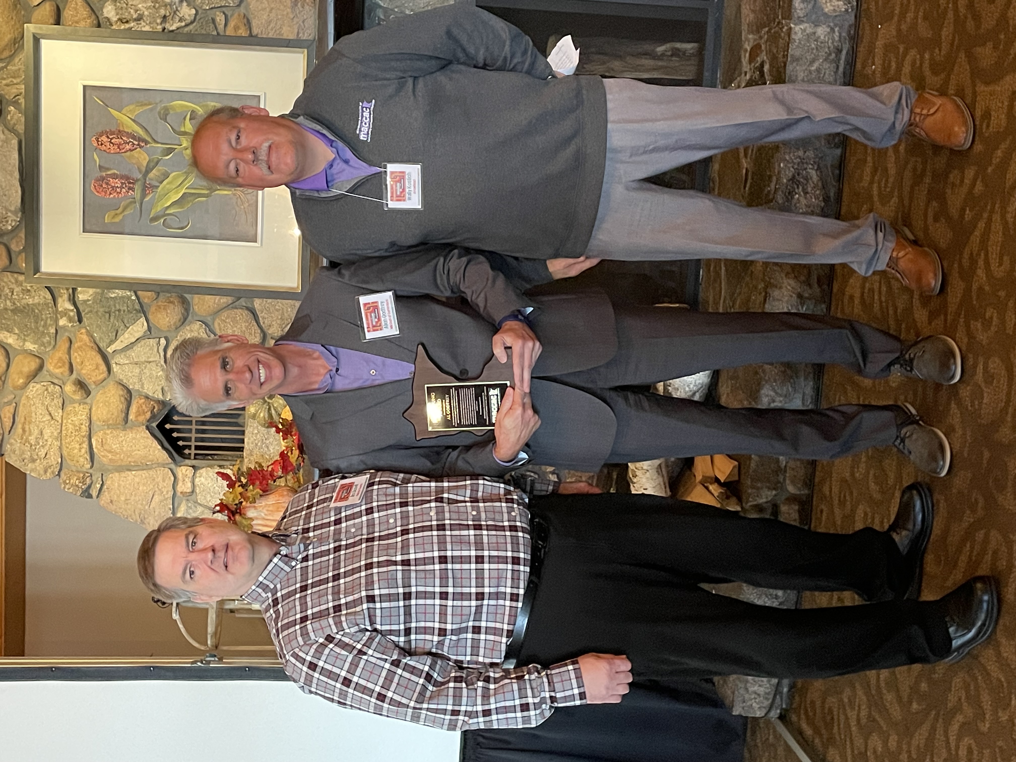 DOC Field Services Director Al Godfrey (center in photo)