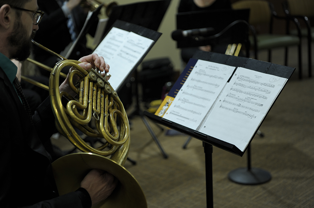 Photo of a french horn player