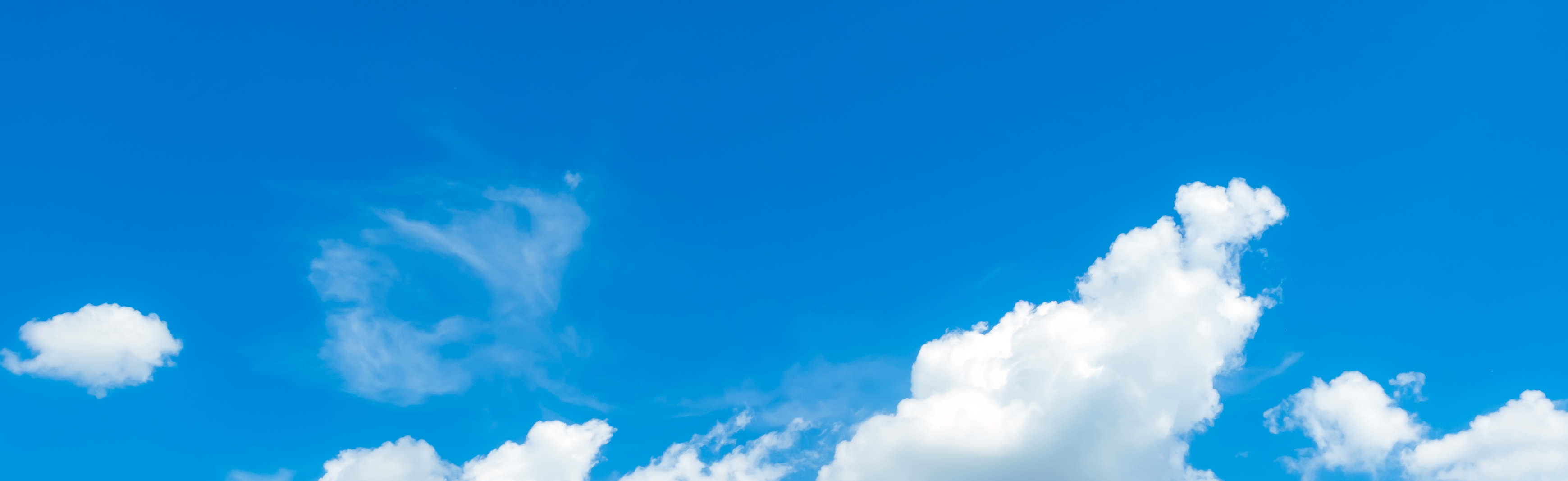 Blue sky with clouds in it. 
