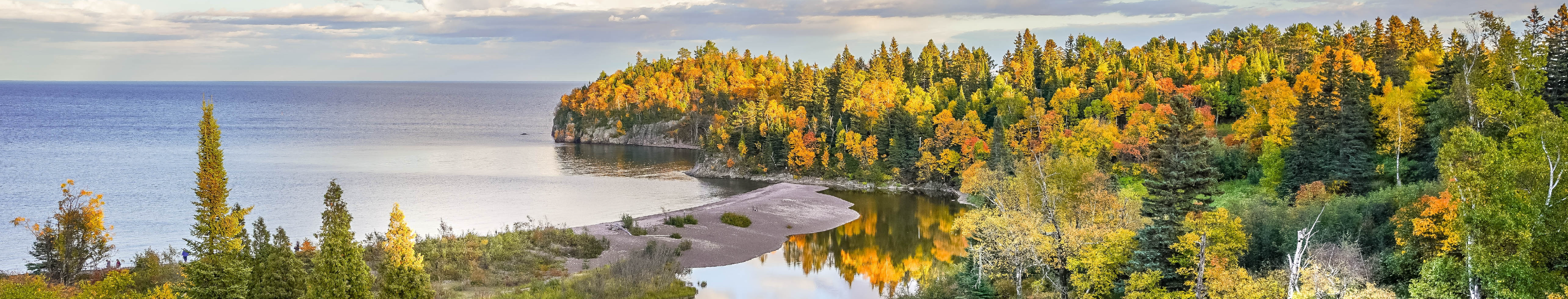 Trees changing color along the edge of Lake Superior
