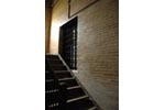 Bars on a Window in a Stairway