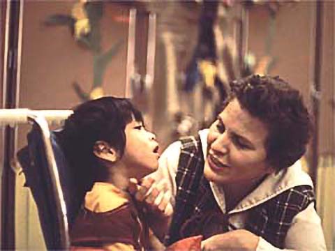 Woman and a child interacting