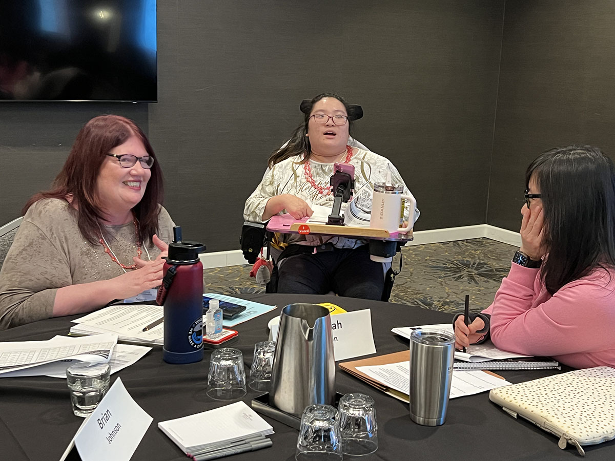 Class 42 February Session - three smiling participants