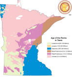Map of Minnesota rock ages, showing pink, purple, blue and brown throughout the state