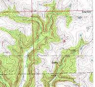Topographic contour map with gridlines, peaks and low areas
