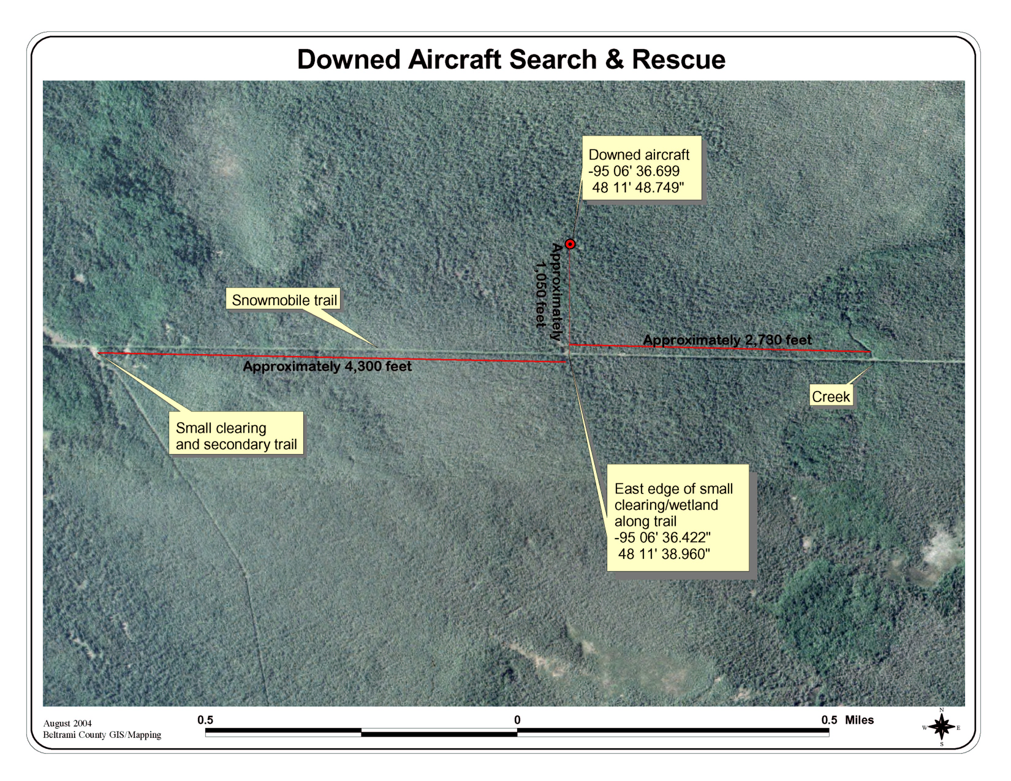 Aerial image shows approximate location of downed aircraft in forested area