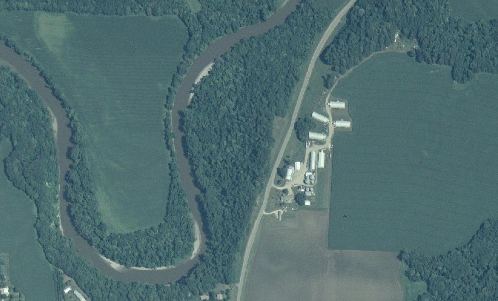 Aerial photo of a winding river and farmland