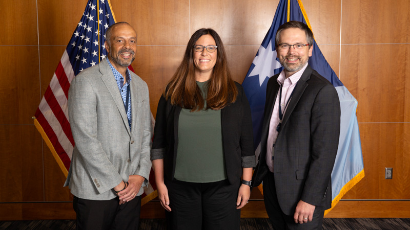 Employee of the Year winner Jennifer Gabriellli with MNIT Commissioner Tarek Tomes and Deputy Commissioner Jon Eichten