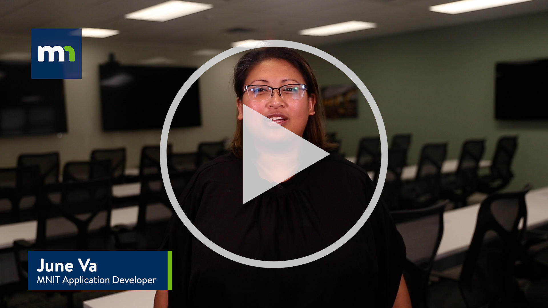 Still image of June Va, MNIT Application Developer with a play button indicating a thumbnail for a video