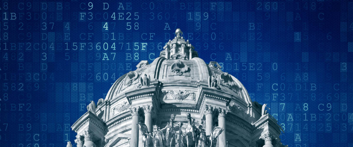 Minnesota capital dome with computer code behind it.