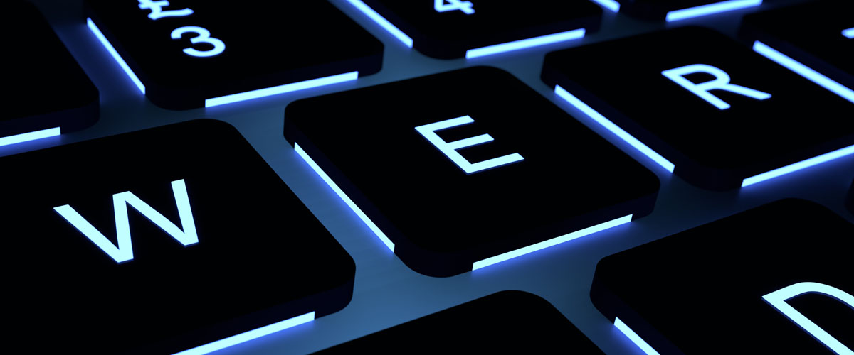 Backlit keys on a computer keyboard.