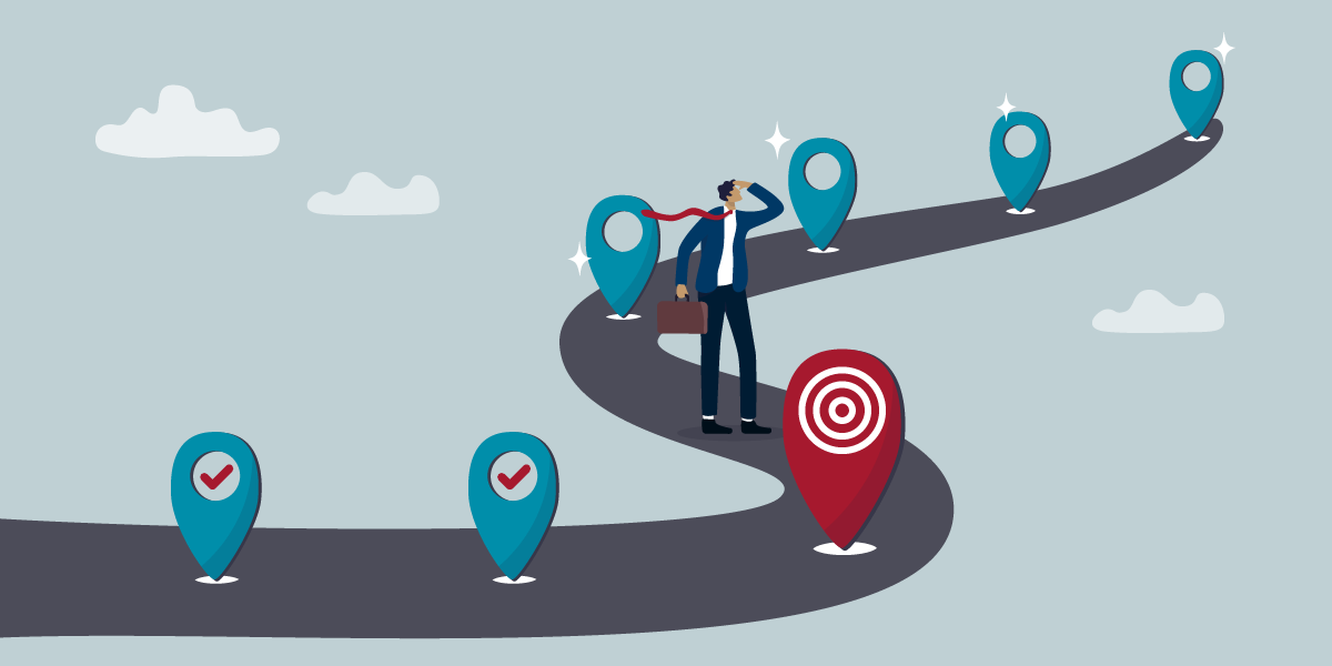 Man on road just past a checkpoint looking ahead. The road forward is lined with unchecked markers.