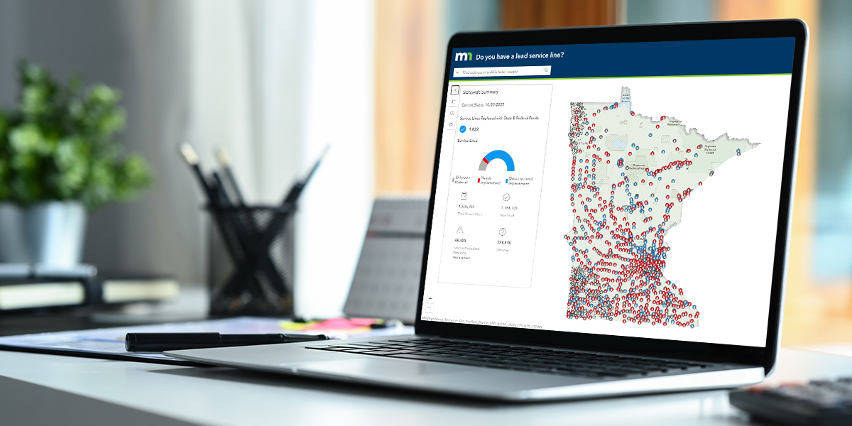 A laptop displaying the state of Minnesota with map locations indicating locations for Lead Drinking Water Service Line Mapping