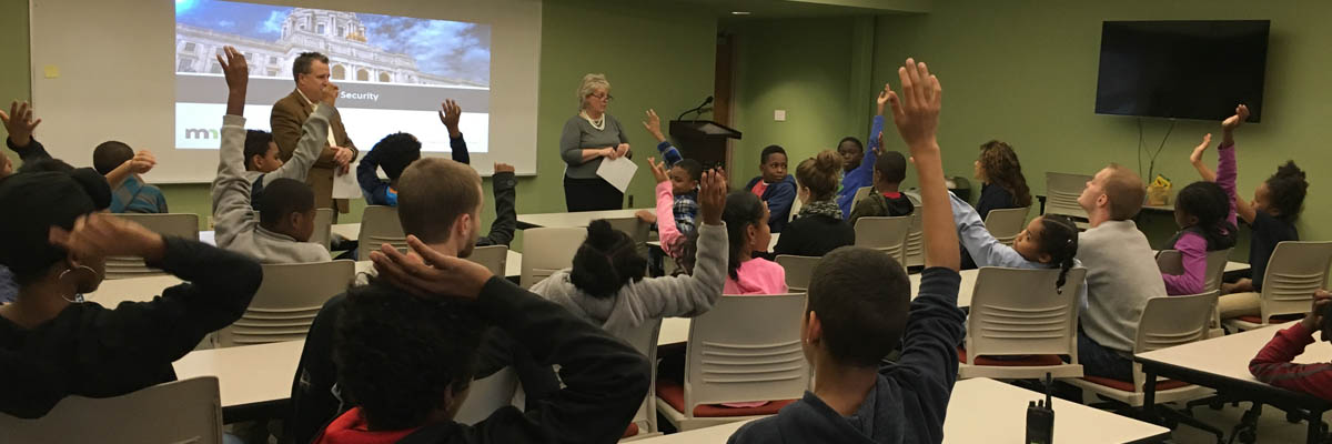 MNIT's Chris Buse teaching kids about cybersecurity.