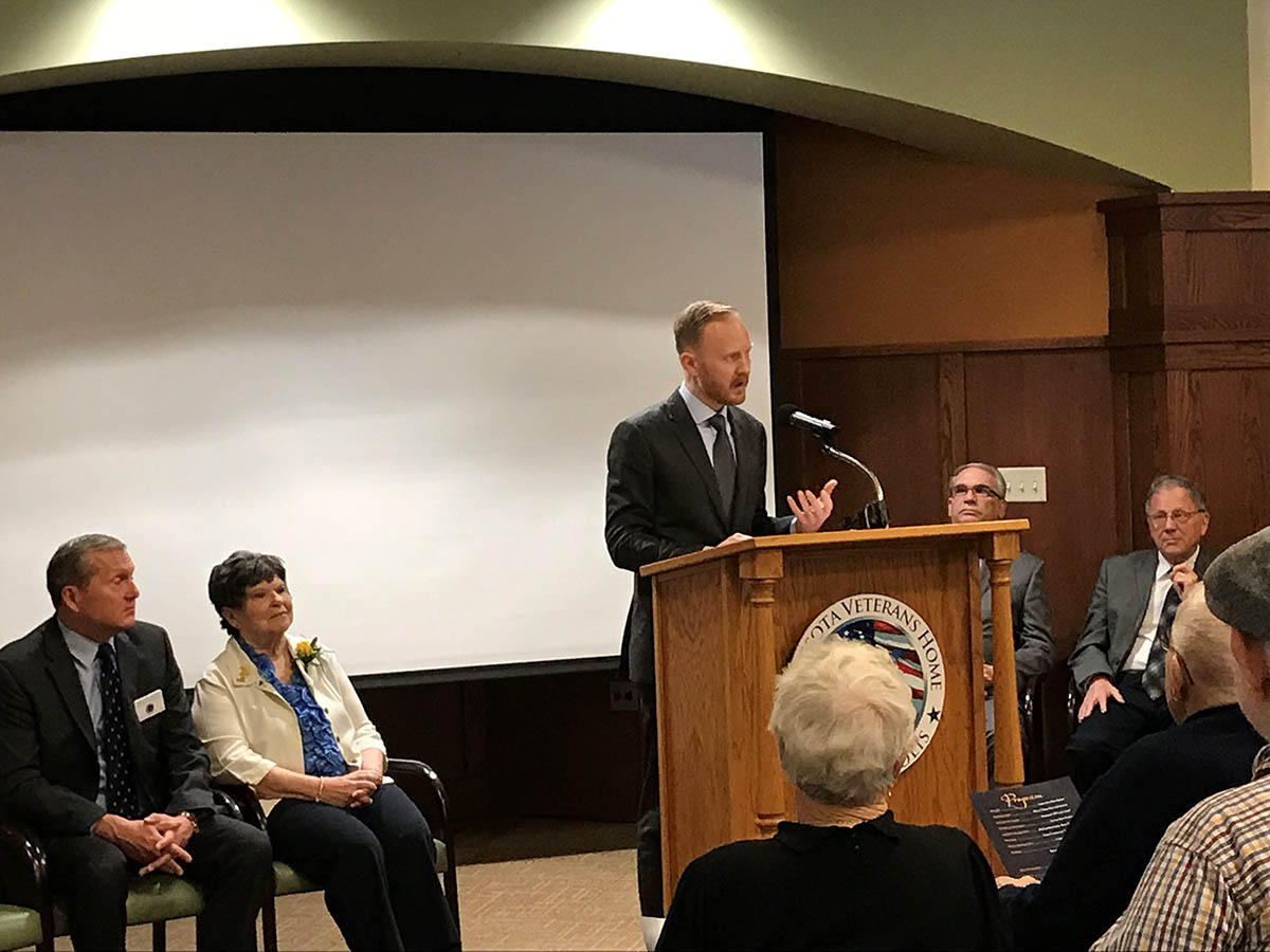 Aaron Call speaking at the opening of a brand new Veterans Home in Minneapolis.
