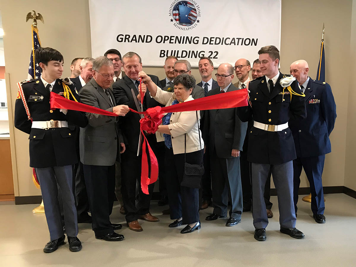 Partners cutting the ribbon at the opening of the brand new Veterans Home in Minneapolis.