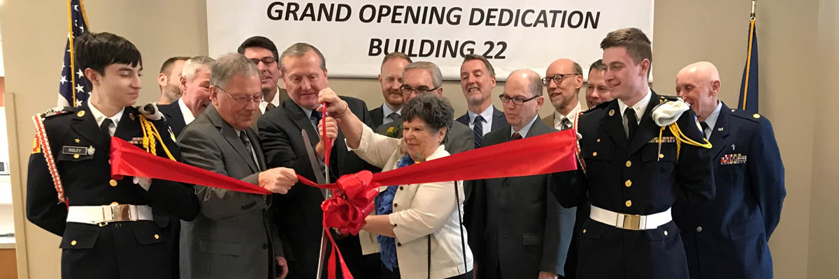 Partners cutting the ribbon at the opening of the brand new Veterans Home in Minneapolis.