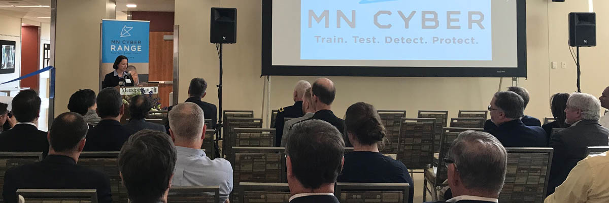 MNIT Commissioner Johanna Clyborne speaking to the audience at the cyber range ribbon cutting ceremony. 