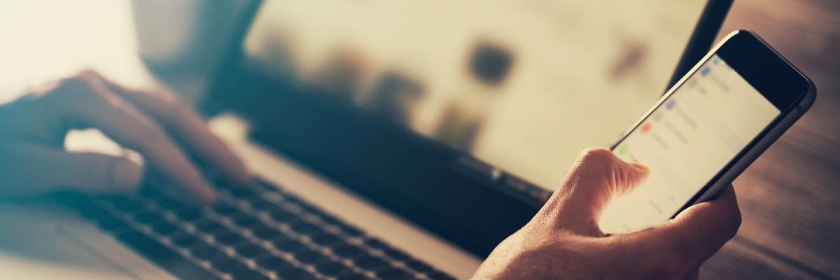 Person navigating a website on a mobile device.