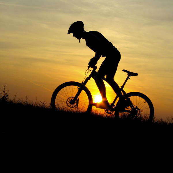mountain bike against sunset