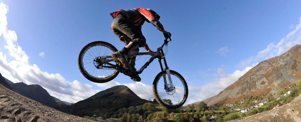 mountain bike rider performing a trick