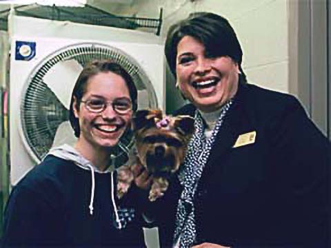 Two women and a dog
