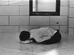 Boy on floor, Cottage 8