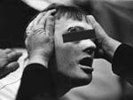 Man with cut on eye, Cottage 3