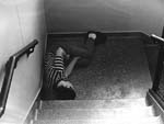 Man in stairwell, unknown cottage