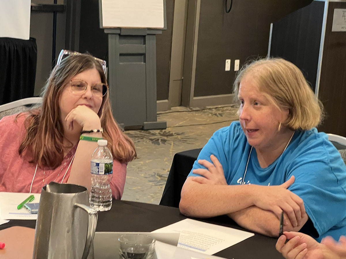 Class 43 November Session - paricipant puts up poster